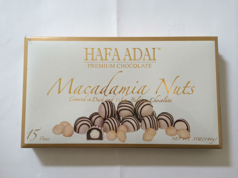 Macadamia Nuts covered in dark and white belgium chocolate