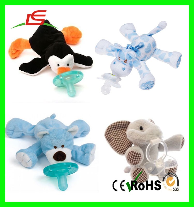 stuffed monkey with pacifier