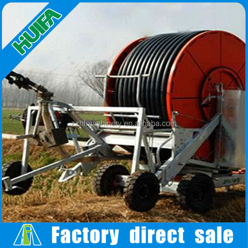 Automatic farm hose reel irrigation system with spray gun