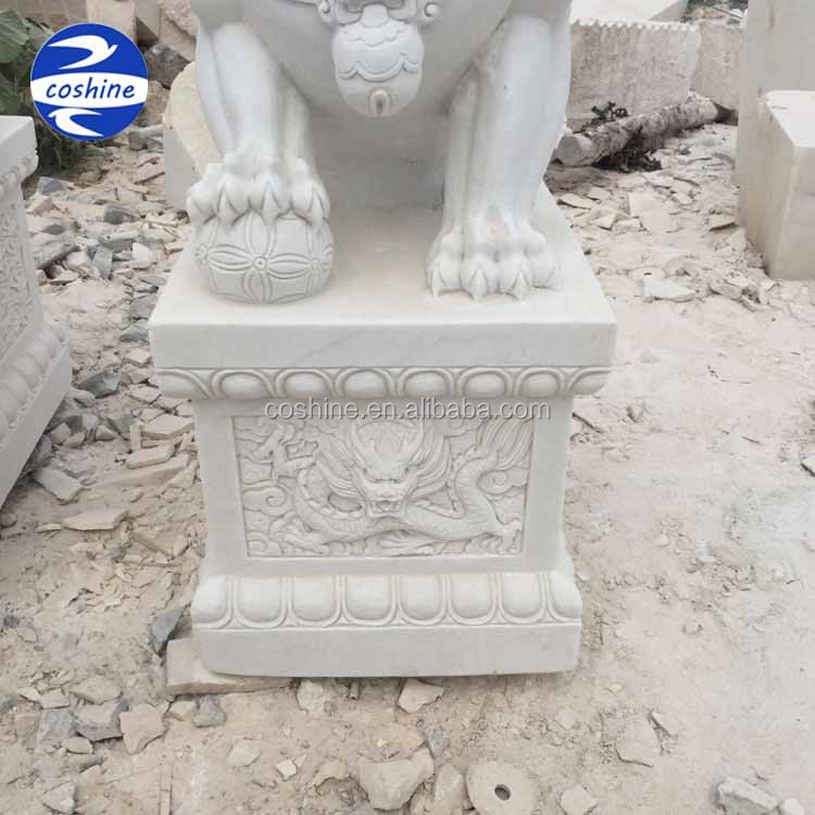 white foo dog statues