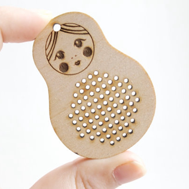 wood cross stitch laser.jpg