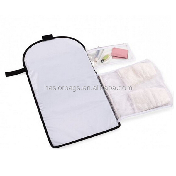 Foldable nappy bag pouch with changing mat