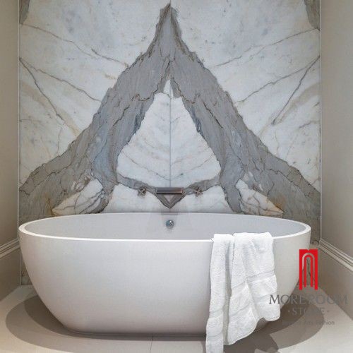 master-bathroom-calacatta-marble-bookmatched-shower - The Glam Pad